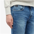 Calvin Klein Men's Medium Wash Slim Taper Jean in Denim Medium