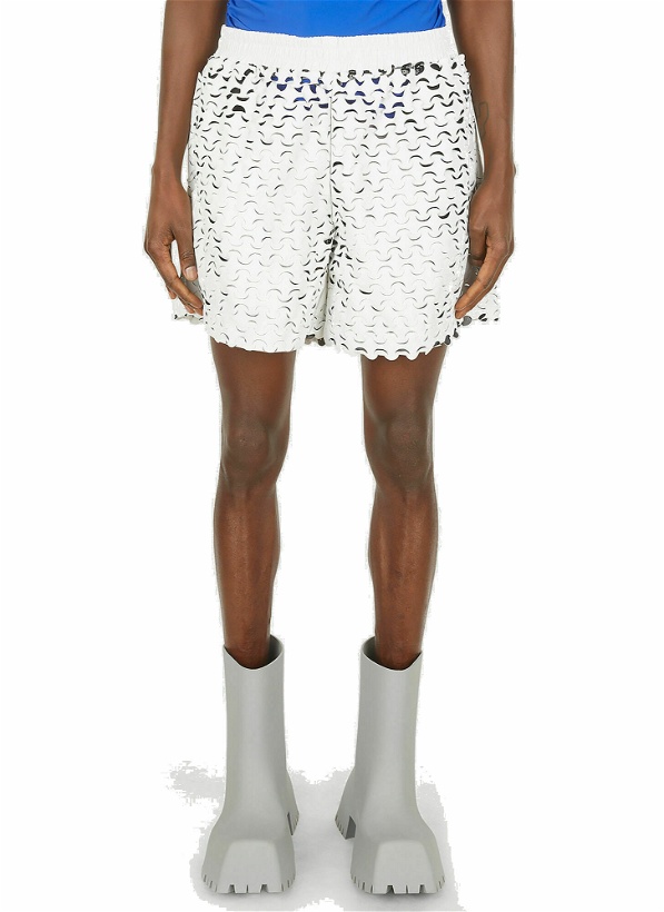 Photo: Cut-Out Wave Shorts in White