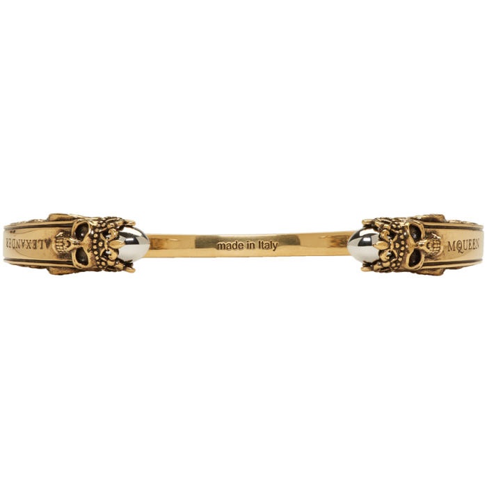 Photo: Alexander McQueen Gold and Silver Engraved Twin Skull Bracelet