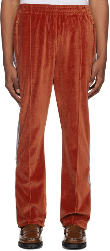 Photo: NEEDLES Orange Narrow Track Pants