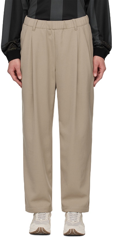 Photo: Dime Tan Pleated Trousers