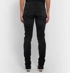 AMIRI - MX1 Skinny-Fit Panelled Distressed Stretch-Denim Jeans - Black