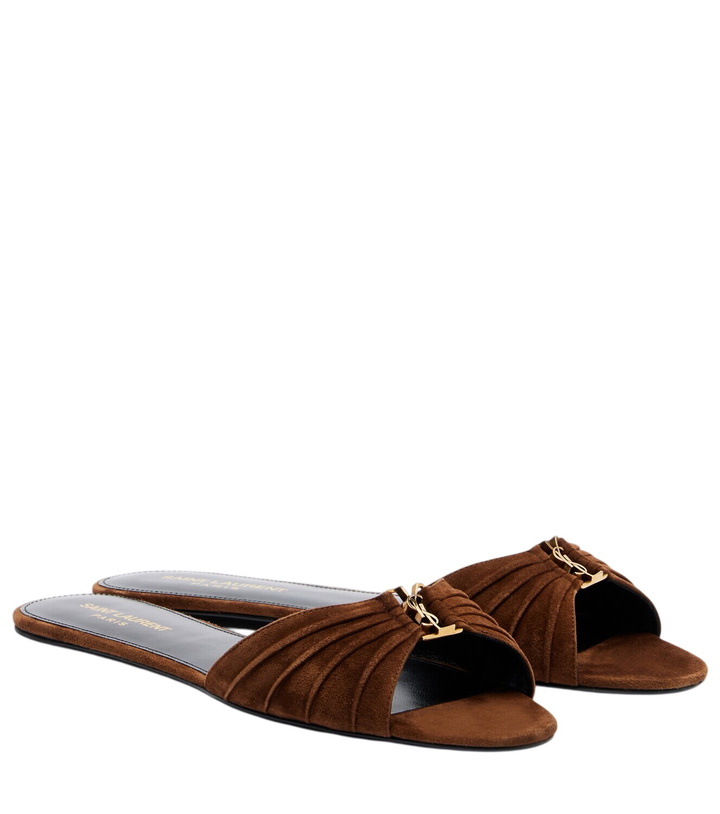 Photo: Saint Laurent Cassandre suede slides