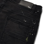 AMIRI - Skinny-Fit Appliquéd Paint-Splattered Distressed Stretch-Denim Jeans - Black