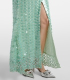 Là Fuori Sequined caped open-back gown