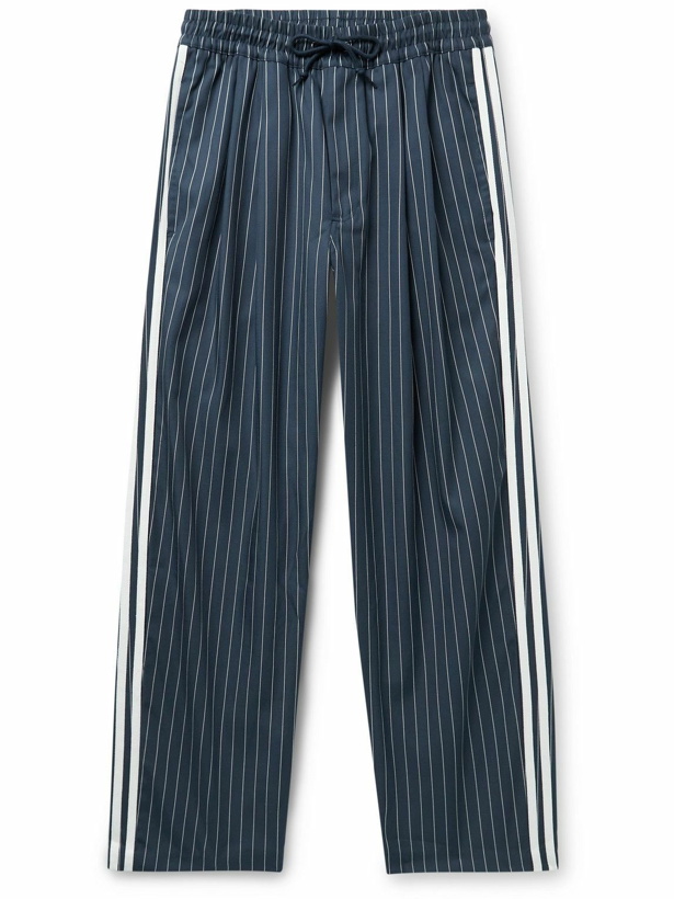 Photo: adidas Consortium - Noah Striped Recycled Twill Trousers - Blue
