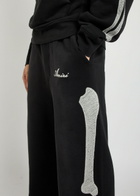 Amiri Amiri Bones Embroidered Cotton Sweatpants Black