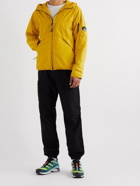 C.P. Company - Logo-Appliquéd Garment-Dyed Shell Hooded Jacket - Yellow