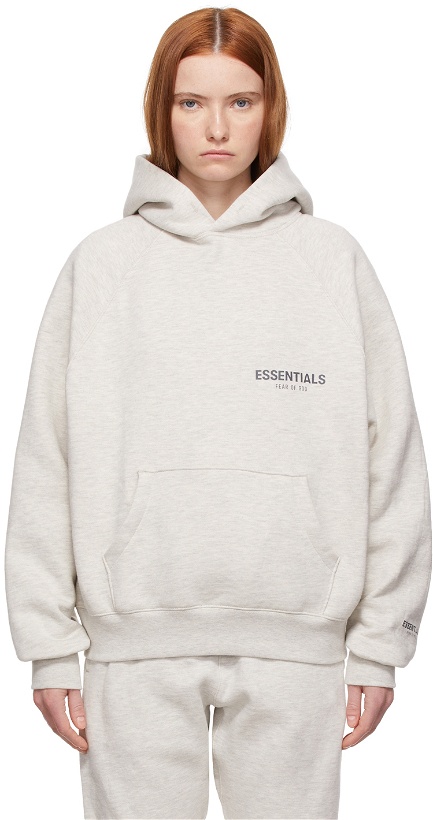 Photo: Fear of God ESSENTIALS Off-White Pullover Hoodie