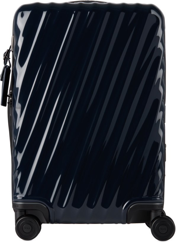Photo: Tumi Navy International Expandable 4 Wheeled Carry-On Suitcase