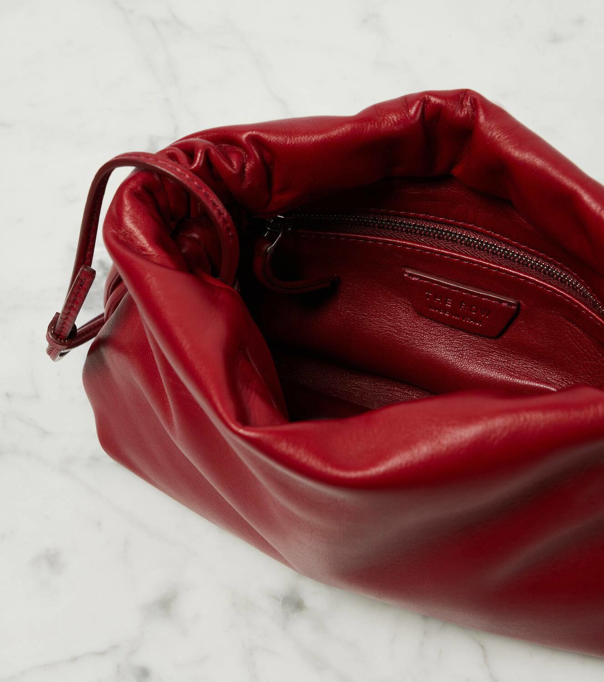 The Row Bourse leather clutch The Row