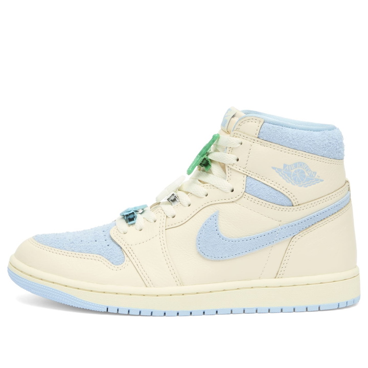 Photo: Air Jordan Women's 1 Retro Hi Sneaker in Pale Ivory/Psychic Blue/Coconut Milk