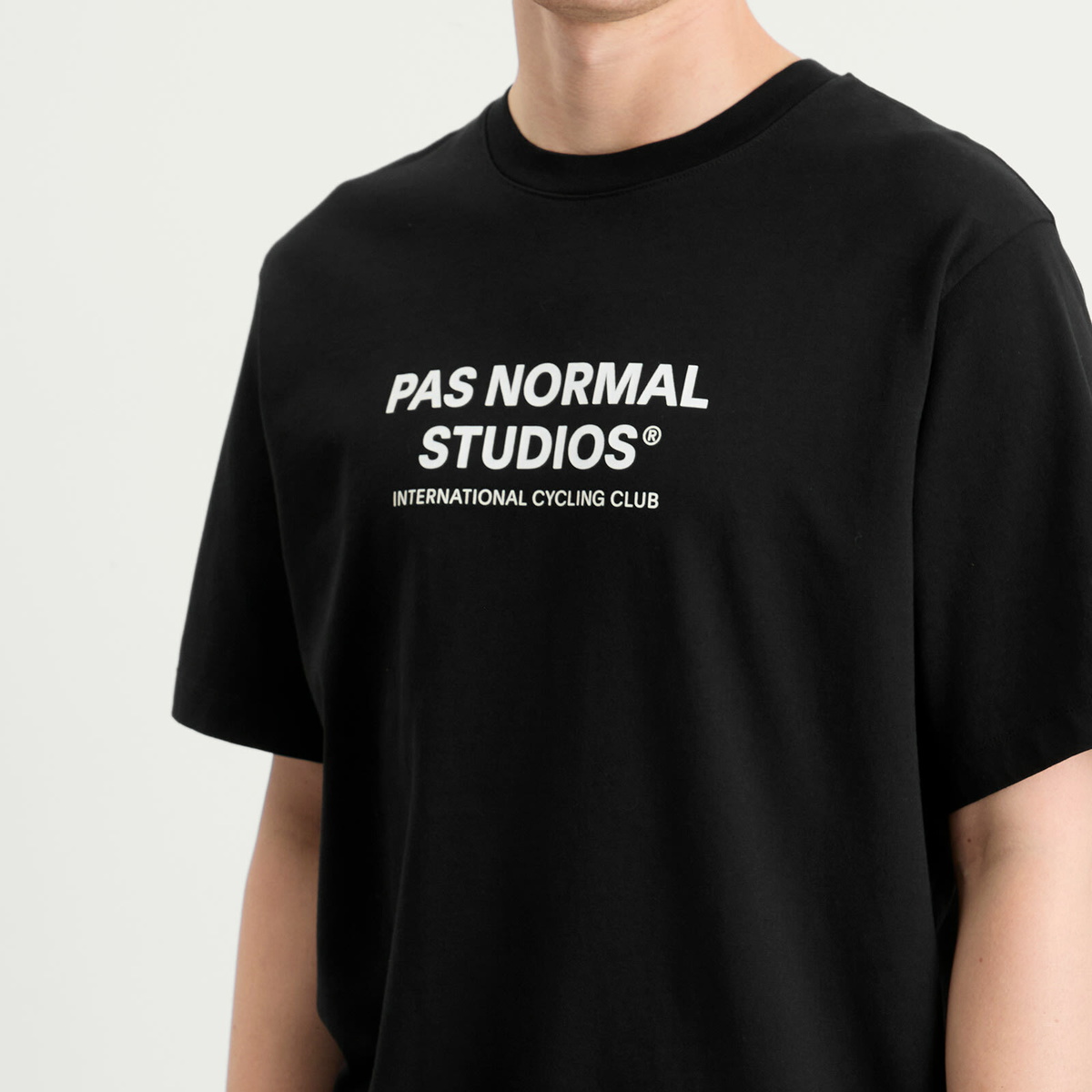 Pas Normal Studios Men's Off-Race Logo T-Shirt in Black