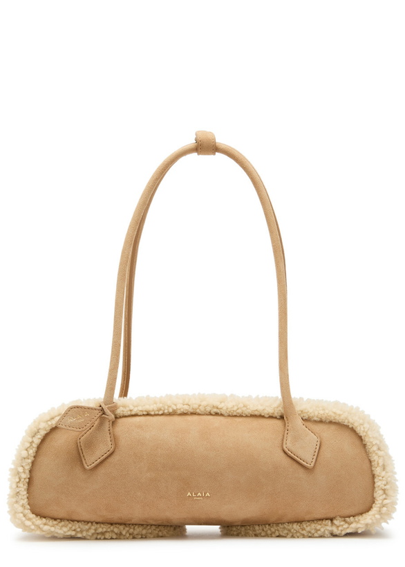 Photo: Alaïa Le Teckle Medium Shearling-trimmed Suede Shoulder bag - Camel - One Size