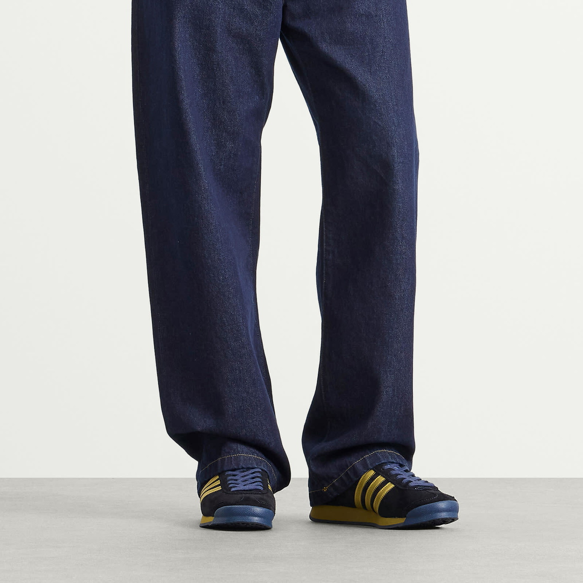 Adidas Men's x SPZL Samoa II Sneaker in Tech Indigo/Matte Gold/Night Indigo