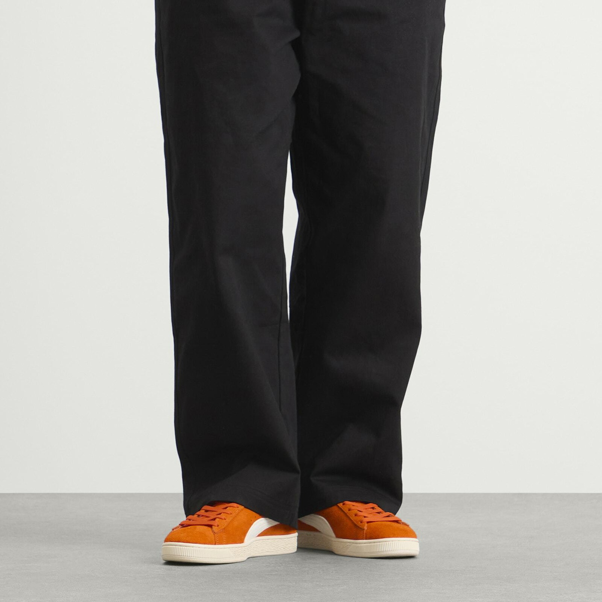Puma Men's Suede Charles F. Stead Sneaker in Orange/White