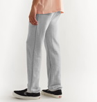 AMIRI - Tapered Logo-Print Mélange Loopback Cotton-Jersey Sweatpants - Gray