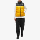 The North Face Men's 1996 Retro Nuptse Vest in Summit Gold/Tnf Black