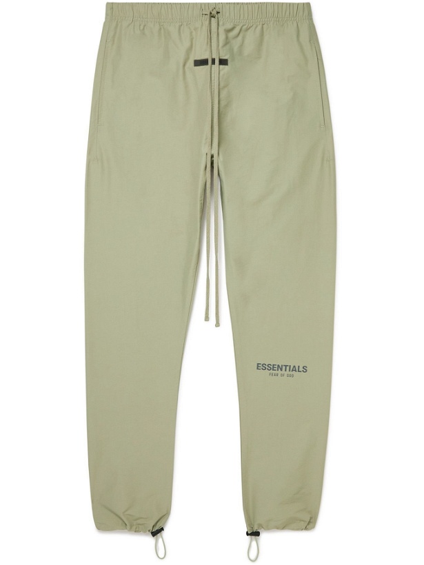 Photo: Fear of God Essentials - Tapered Logo-Print Cotton-Blend Sweatpants - Green