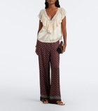 Dôen Yadira lace-trimmed ruffled silk blouse