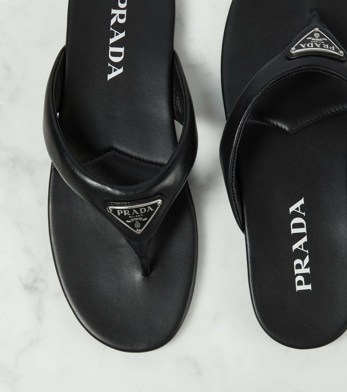 Prada Logo padded leather thong sandals Prada