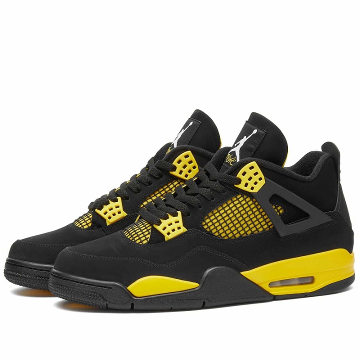 Photo: Air Jordan Men's 4 Retro Sneakers in Black/Tour Yellow