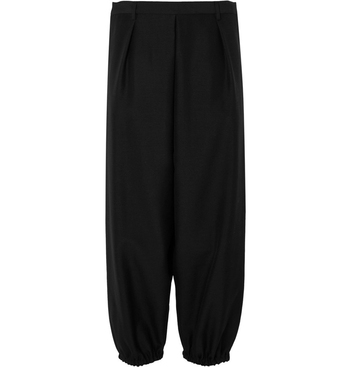 Photo: SAINT LAURENT - Tapered Pleated Wool and Mohair-Blend Trousers - Black