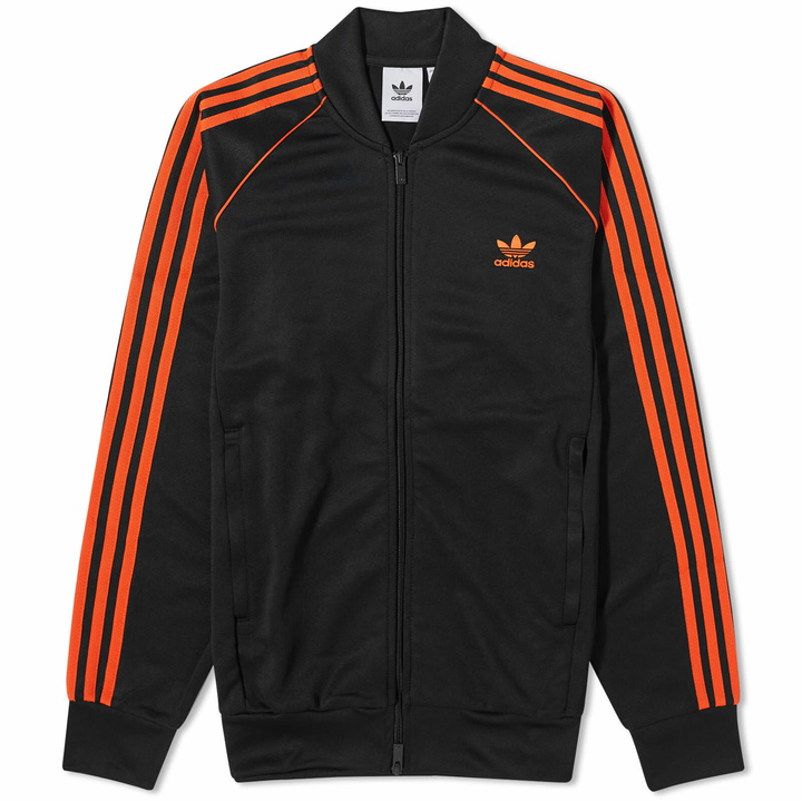 Photo: Adidas Men's Superstar Track Top in Black/Orange