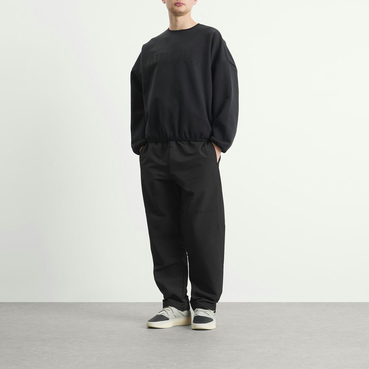 Adidas x FOG adidas x Fear Of God Athletics Brushback Woven Storm Pant in Black