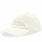 Sporty & Rich Classic Logo Hat in Cream/Gold Embroidery