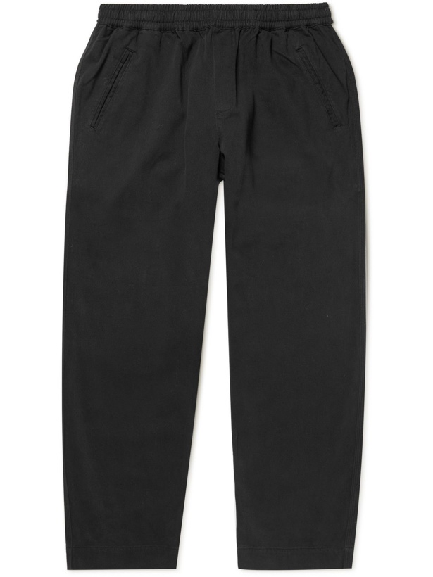 Photo: Folk - Assembly Cropped Tapered Pleated Garment-Dyed Cotton-Twill Trousers - Black