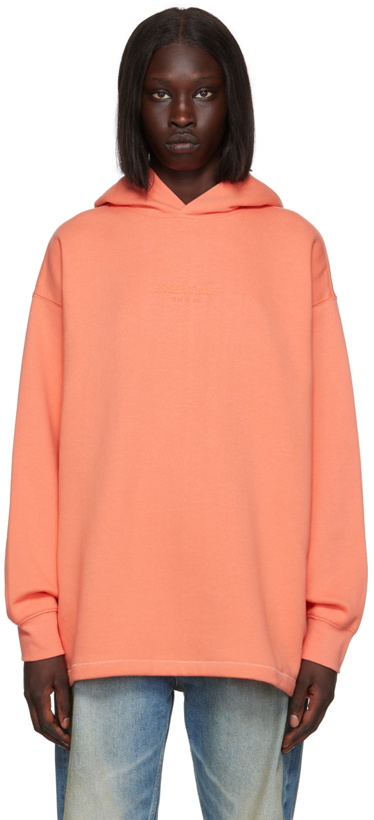 Photo: Fear of God ESSENTIALS Pink Relaxed Hoodie