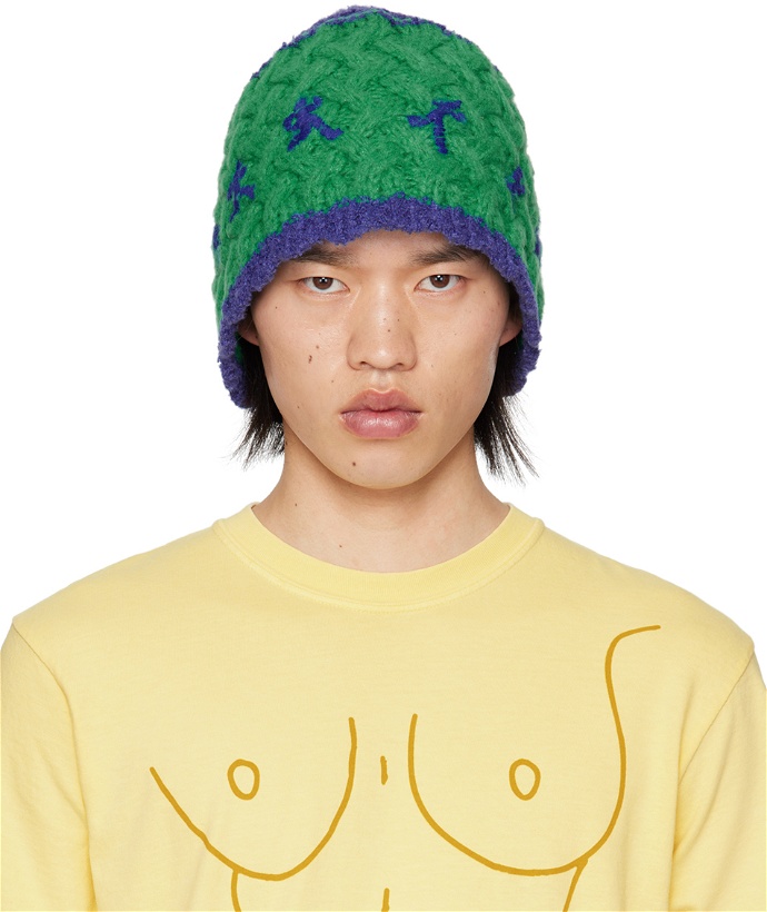 Photo: KidSuper Blue & Green Running Man Crochet Hat