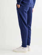 Calvin Klein Underwear - Tapered Logo-Print Loopback Cotton-Blend Jersey Sweatpants - Blue