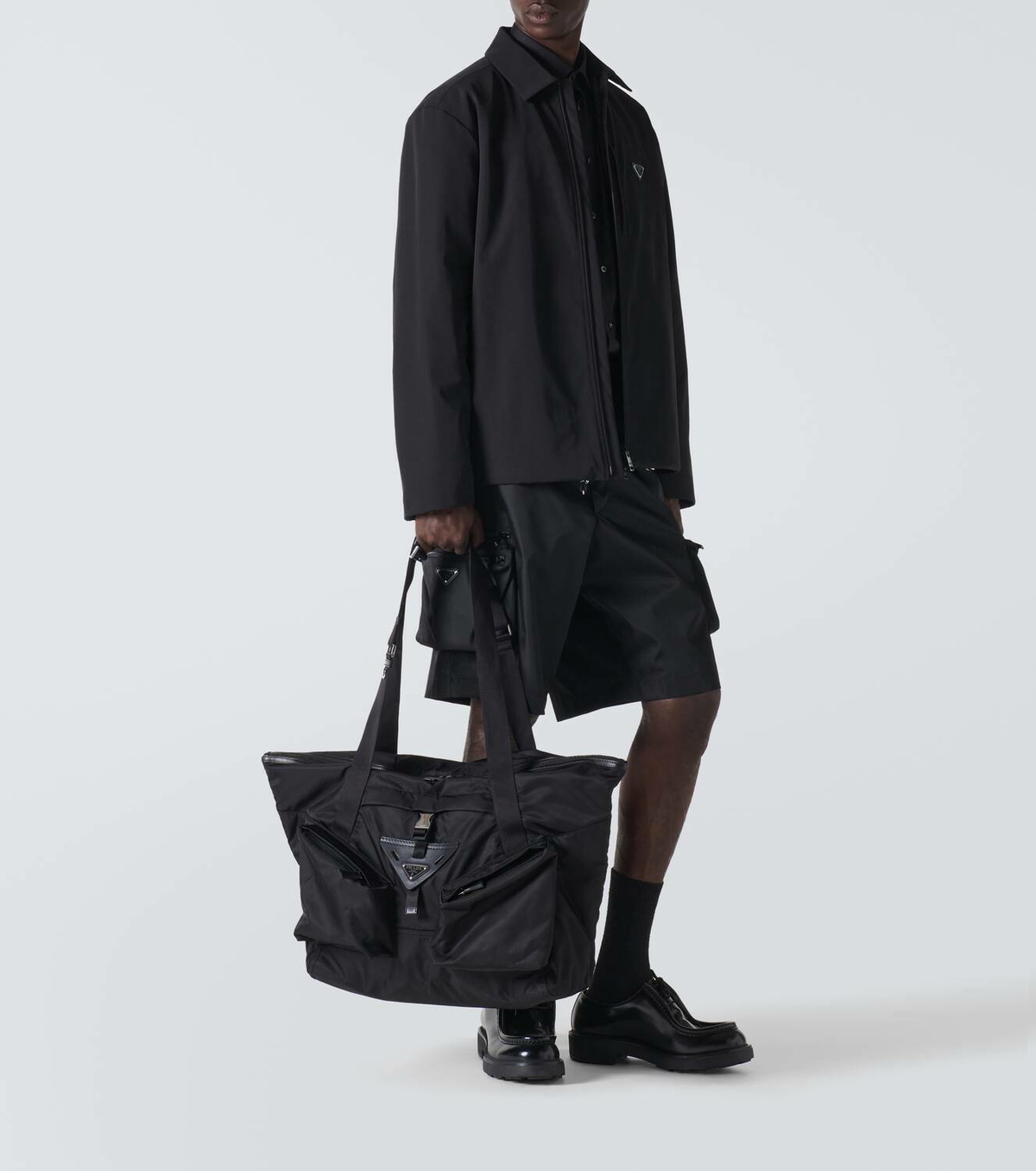 Prada Re-Nylon leather-trimmed duffel bag