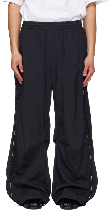 Photo: We11done Black Logo Tape Track Pants