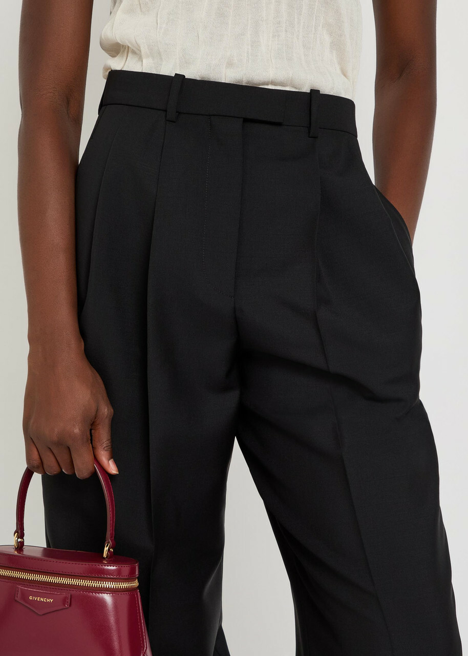 Givenchy Pleated Tapered-leg Wool and Mohair-blend Trousers Black