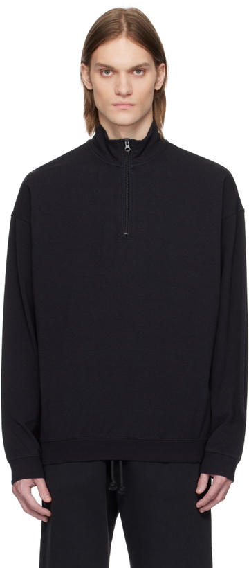 Photo: SKIMS Black Jersey Lounge Relaxed Quarter Zip Sweatshirt