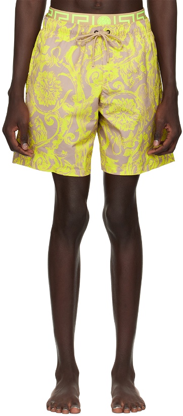 Photo: Versace Underwear Yellow Barocco Stencil Swim Shorts