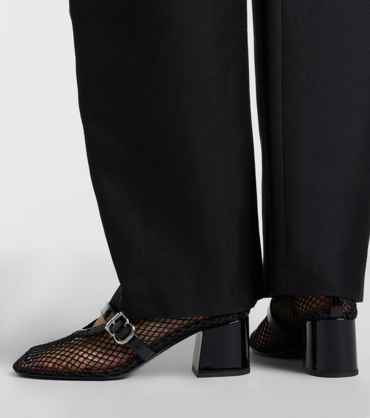 Alaïa Fishnet leather-trimmed Mary Jane pumps