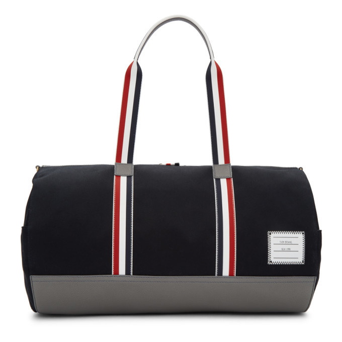 Photo: Thom Browne Navy Gym Duffle Bag