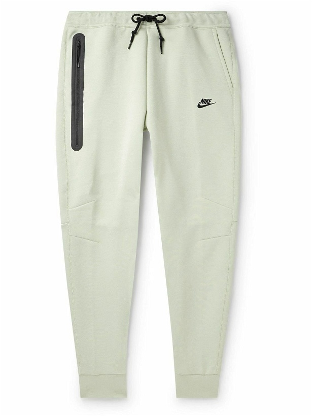 Photo: Nike - Tapered Cotton-Blend Tech Fleece Sweatpants - Blue
