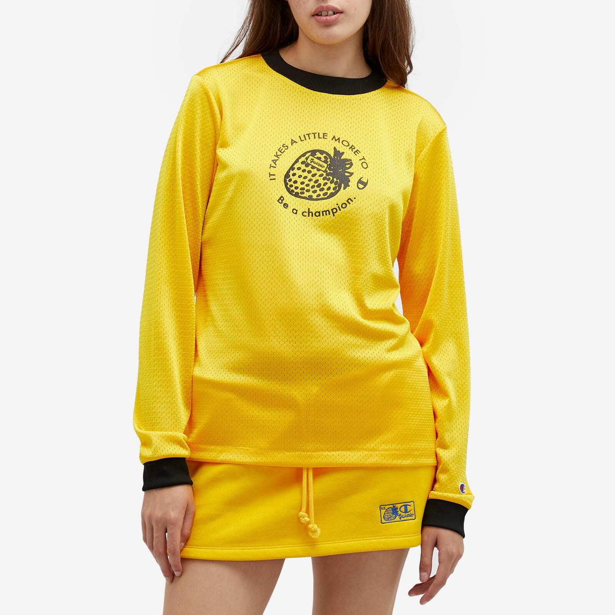 Champion Women s x Guizio Long Sleeve T Shirt in Yellowblack Champion