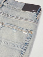 AMIRI - Slim-Fit Appliquéd Distressed Jeans - Blue