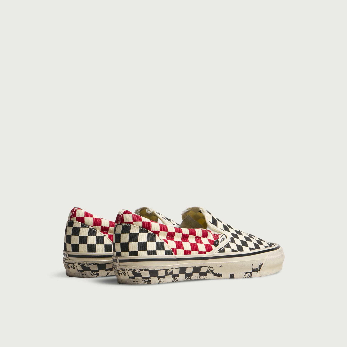 Vans Men's A.O.D. LX Classic Slip-On 98 in Black/Red Checkerboard