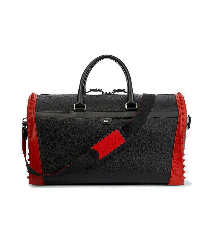 Photo: Christian Louboutin Sneakender spiked leather duffel bag