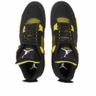 Air Jordan Men's 4 Retro Sneakers in Black/Tour Yellow