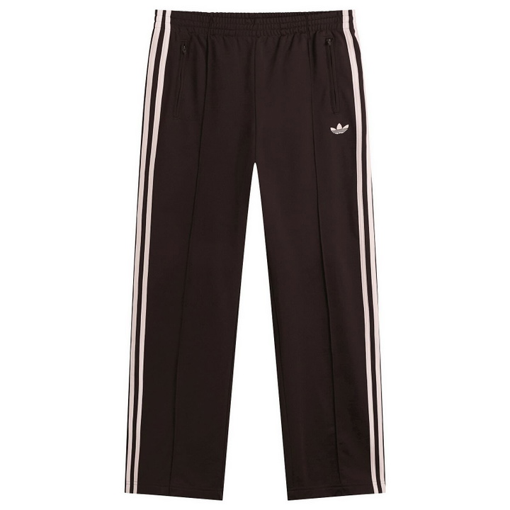 Photo: Adidas Women's Firebird Loose Trackpants in Aurora Coffee/Sandy Pink