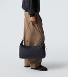 The Row Logan E/W leather-trimmed crossbody bag