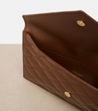 Saint Laurent Paris quilted patent leather pouch